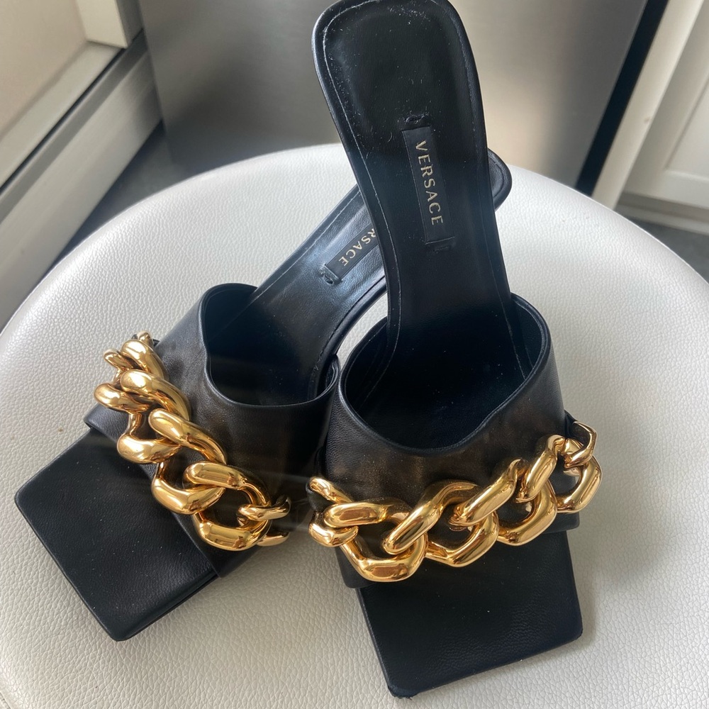 Versace Black Mules with Gold Chain Accent